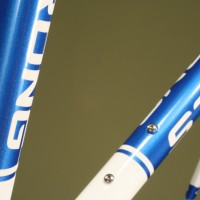 Custom Blend Titanium Cross Frame & Alpha QCX20 Fork. Custom White Powdercoat with Blue Panels.
