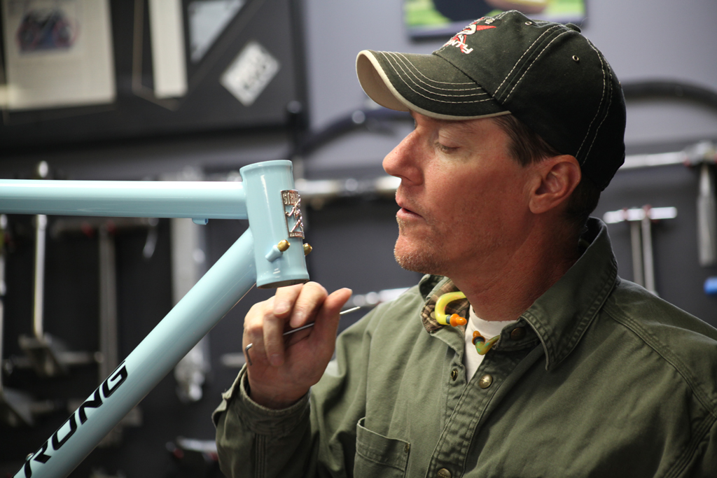 Attachment of the optional pewter head badge on custom frames is a memorial to the days when bikes weren’t mass-produced and builders were proud of their craft.