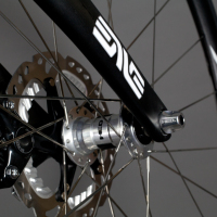 Custom Blend titanium disc all-road frame with Ultegra Di2. It can take tires up to 35mm.