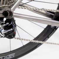 Titanium gravel bike with Sram eTap, Reynolds Attack and Black Magic paint.