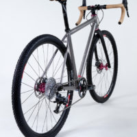 Titanium gravel bike with Sram Force 1 and flat mount brakes.