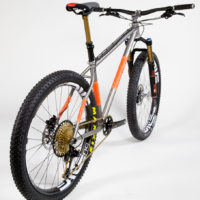 Titanium 27.5″ Plus with SRAM Eagle and Fox 34. See more mountain bikes in our mountain bike gallery.