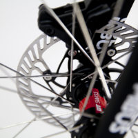 Custom Blend titanium disc road bike. Featuring Campy Record with H11 brakes and cranks along with a Columbus Futura fork, internal headset and Enve cockpit.
